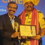 Actor Pramod Shetty (right) presented the award shield and certificate to Mr. Ramkumar Singaram,